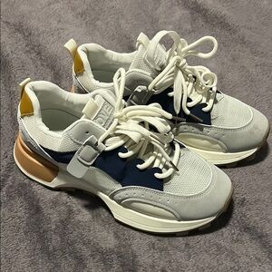 White and Navy Sneakers with Tan Accents